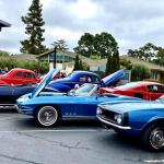 Specatators look at classic cars at the 2023 Oakmont Car Show (Photo by Julie Kiil)